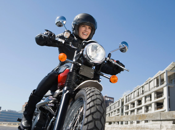 woman riding a motorcycle